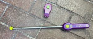 A clicker and telescoping click stick for training cats and dogs.